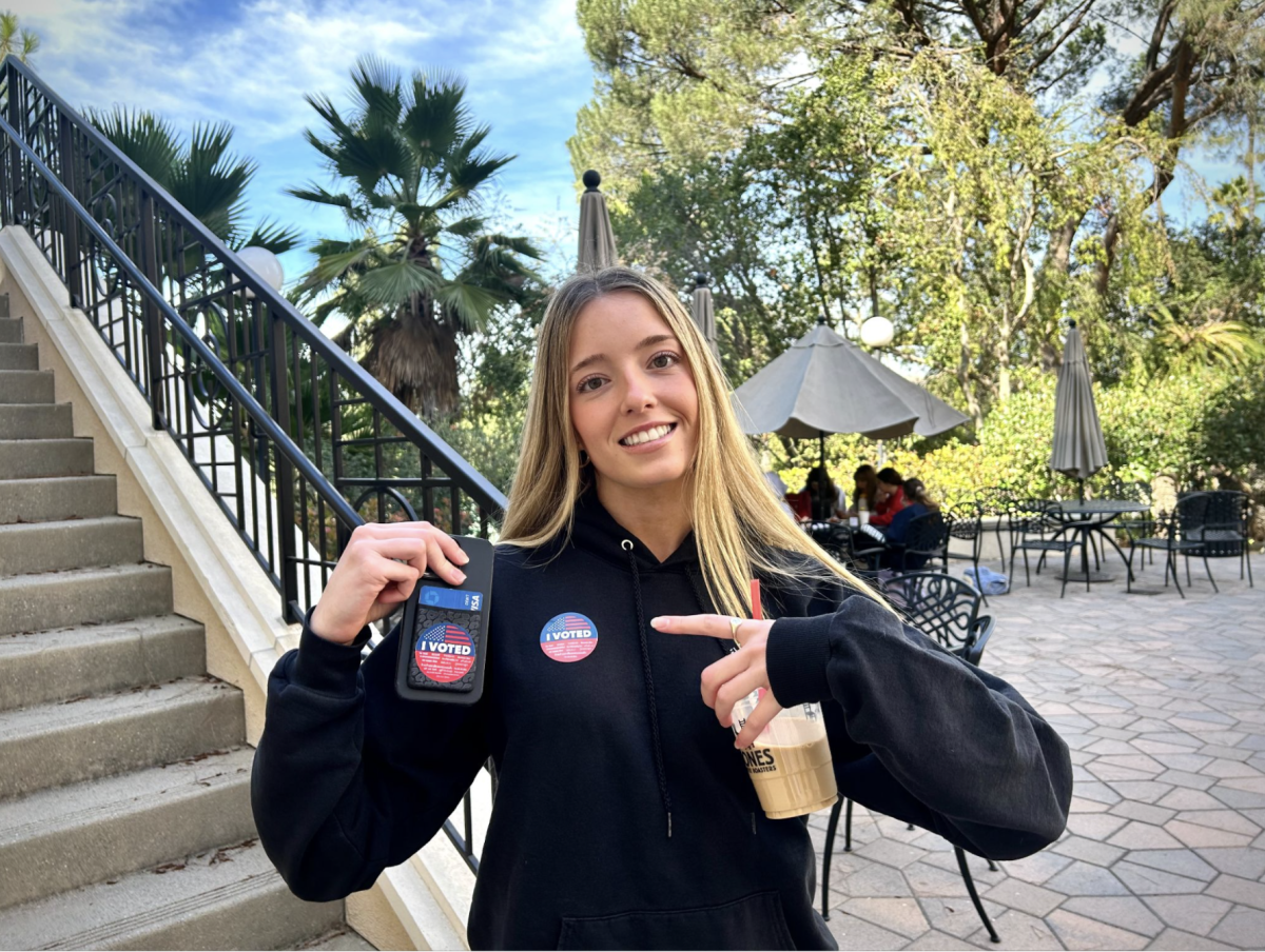 Senior Sophie Limongeli proudly shows off her “I Voted” sticker!
